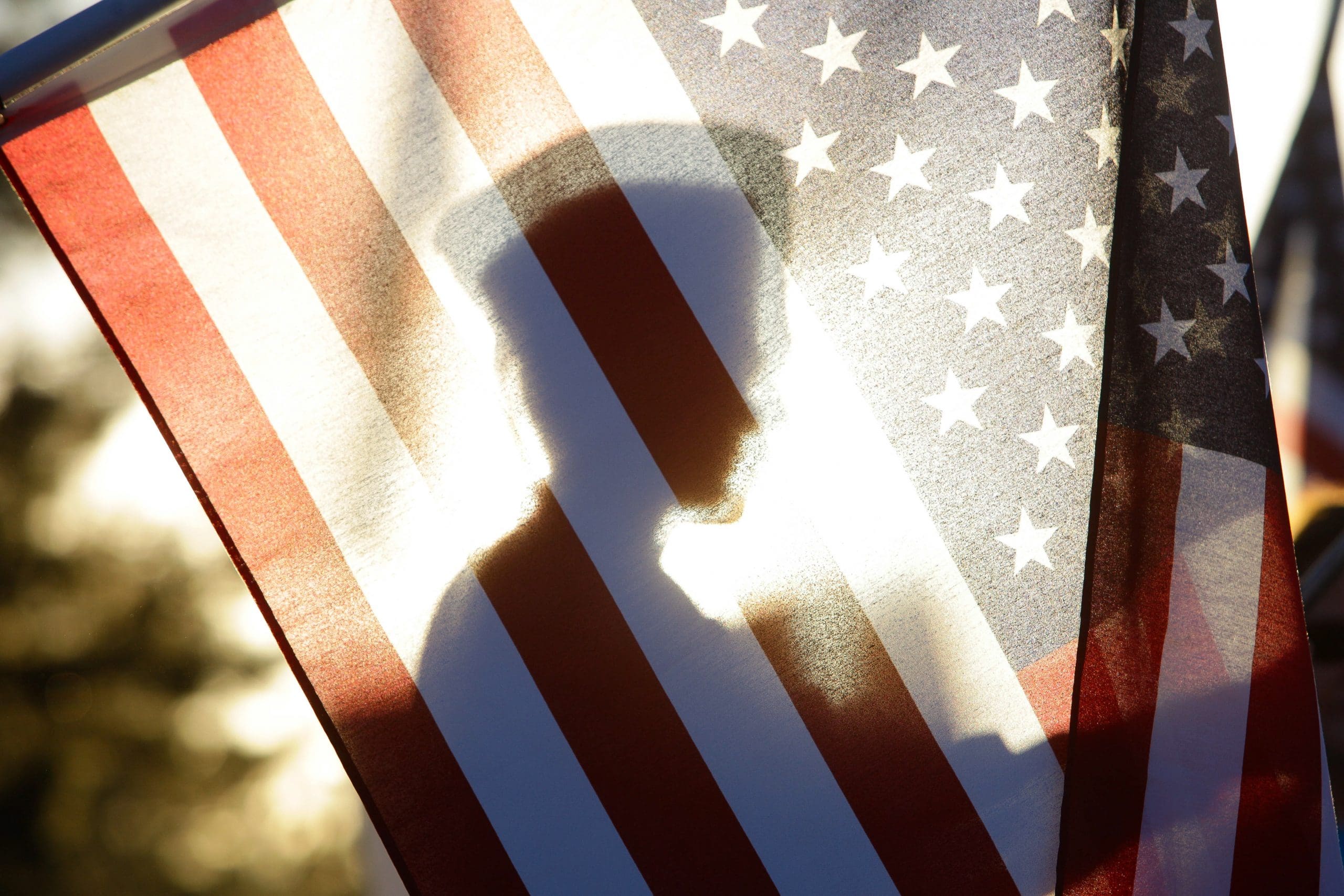 People silhouette flag USA